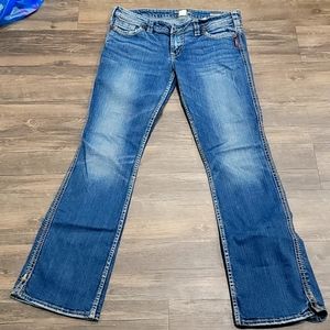 Womans silver jeans size 32